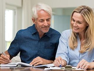 An image of a couple planning their bathroom renovations